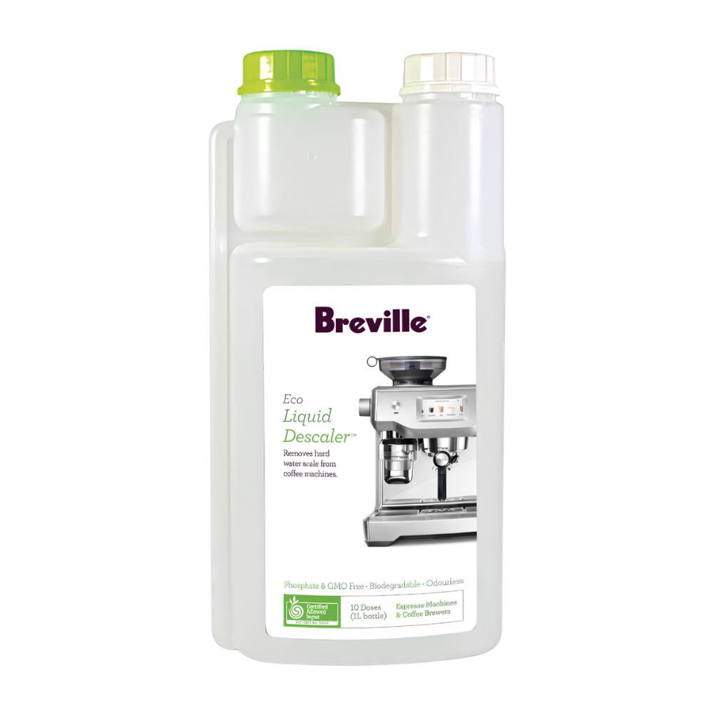 A bottle of Breville Eco Liquid Descaler on a plain white background. The bottle is made of semi-translucent white plastic with a bright green cap on the left and a white cap on the right, featuring a large white label with the Breville logo and an illustration of a coffee machine.