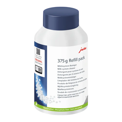 Bottle of Jura milk system cleaner with blue cap on a white background