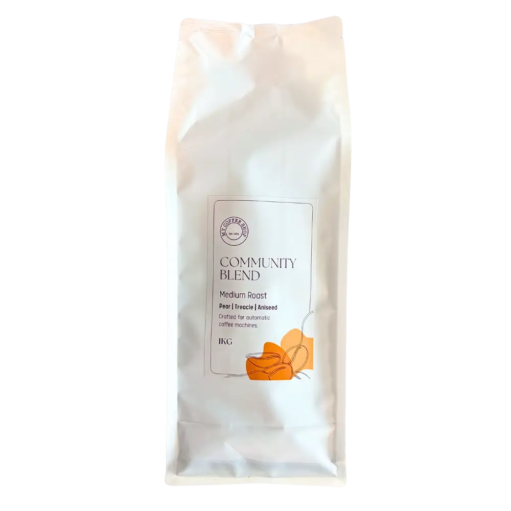 Coffee bag labeled 'Community Blend' on a white background