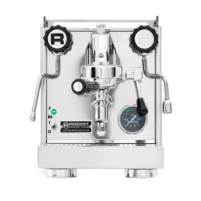 A Rocket Espresso Appartamento espresso machine in polished stainless steel with chrome accents, featuring two black and white adjustment dials, a pressure gauge, and a lever arm on a clean white background.