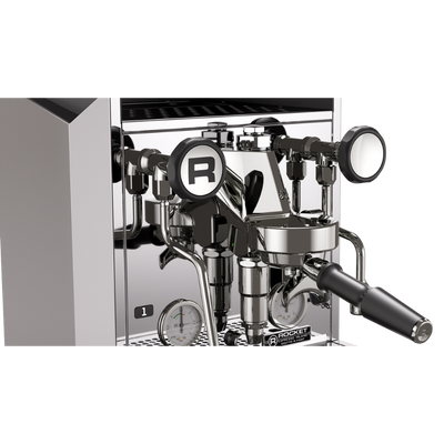 A close-up of a professional espresso machine's steam and milk system, featuring a polished stainless steel portafilter, steam wand, and piping with black accents, set against a clean white background.